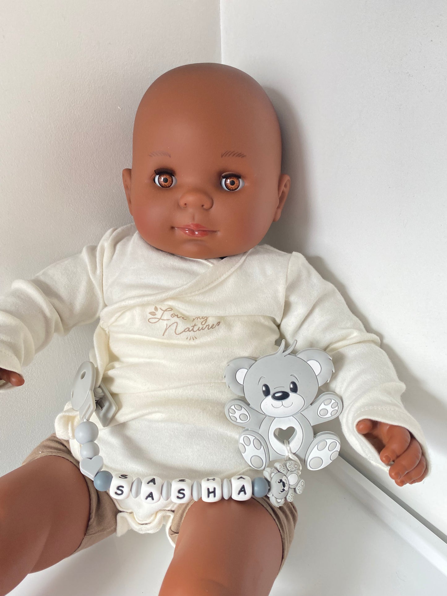 Anneau de dentition avec attache nounours gris tendre