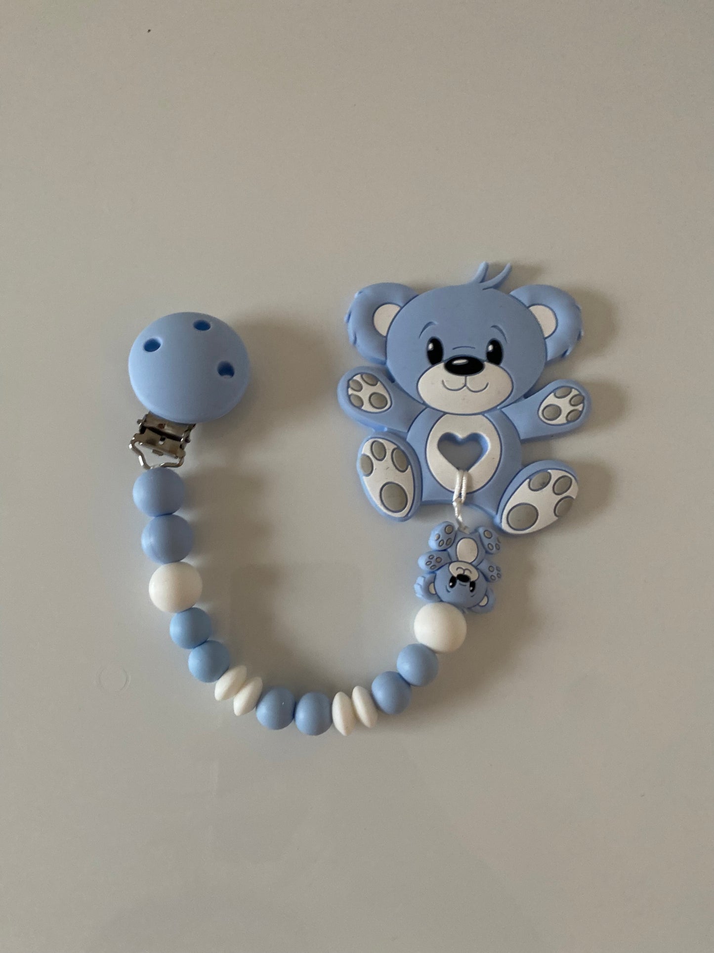 Anneau de dentition avec attache nounours bleu tendresse