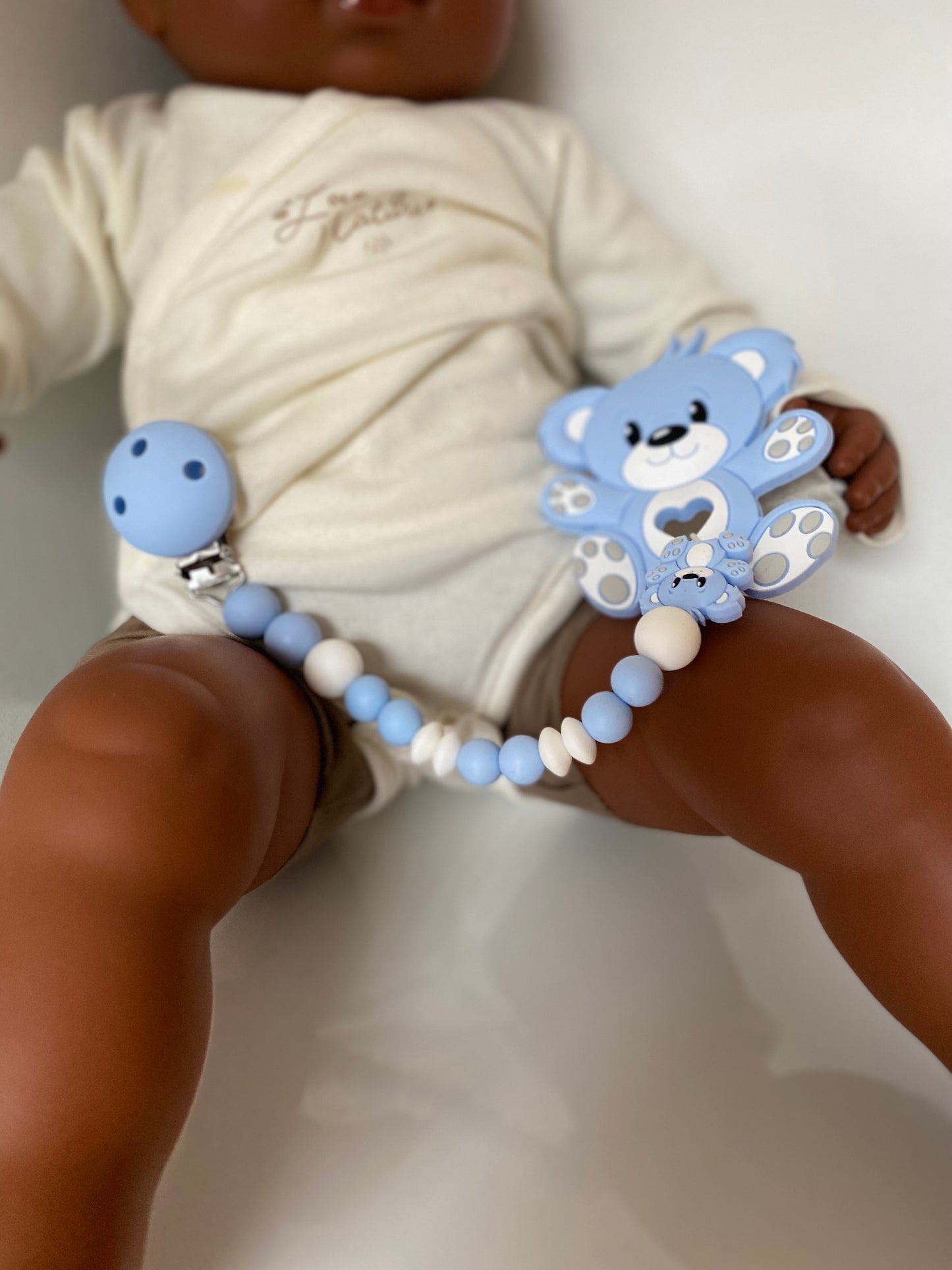 Anneau de dentition avec attache nounours bleu tendresse